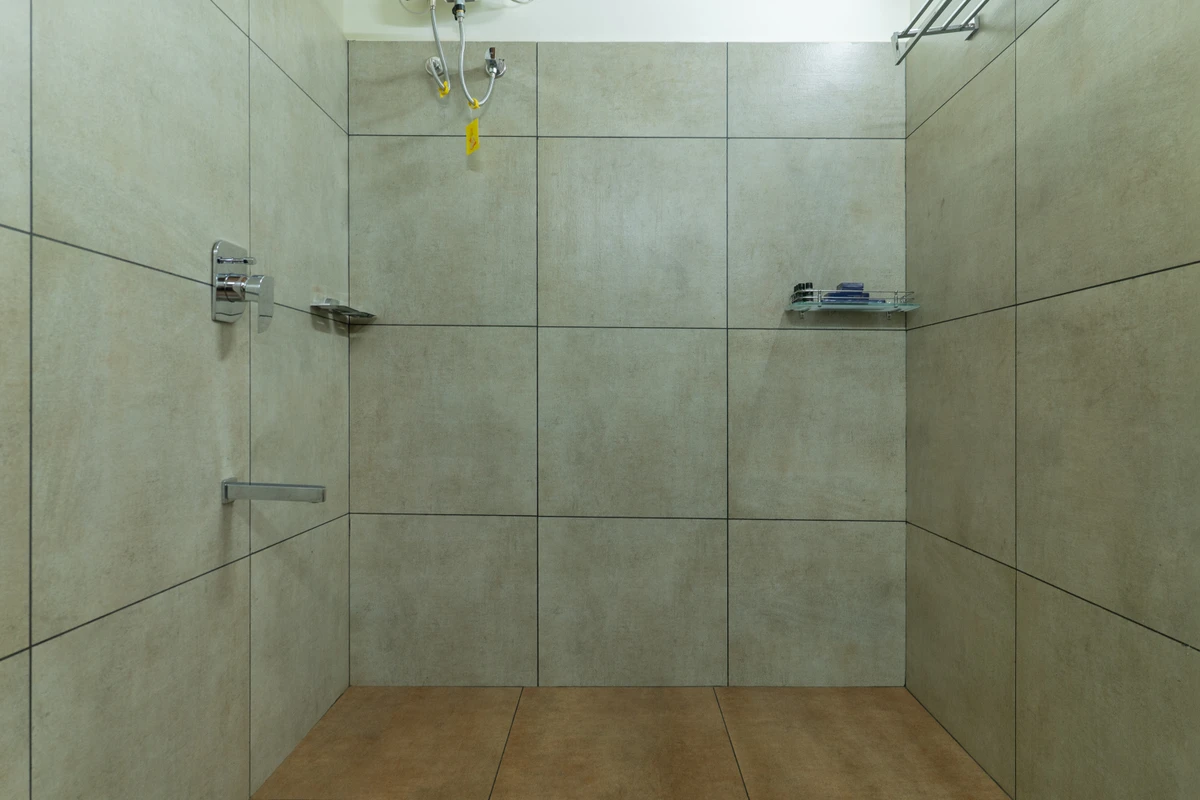 Deluxe bathroom with modern fittings at Mountain Residence,boche 1000 acre a luxury resort in Wayanad Kerala