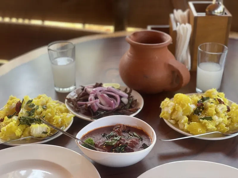 Authentic traditional Kerala food platter served at Resto Toddy Pub during your stay in wayanad Authentic traditional Kerala food platter served at Resto Toddy Pub during your stay in wayanad